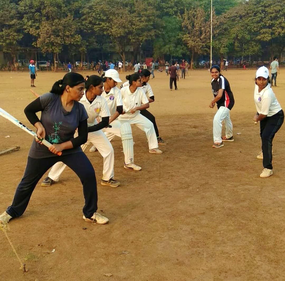 Girls getting prepared in a cricket academy in Mumbai